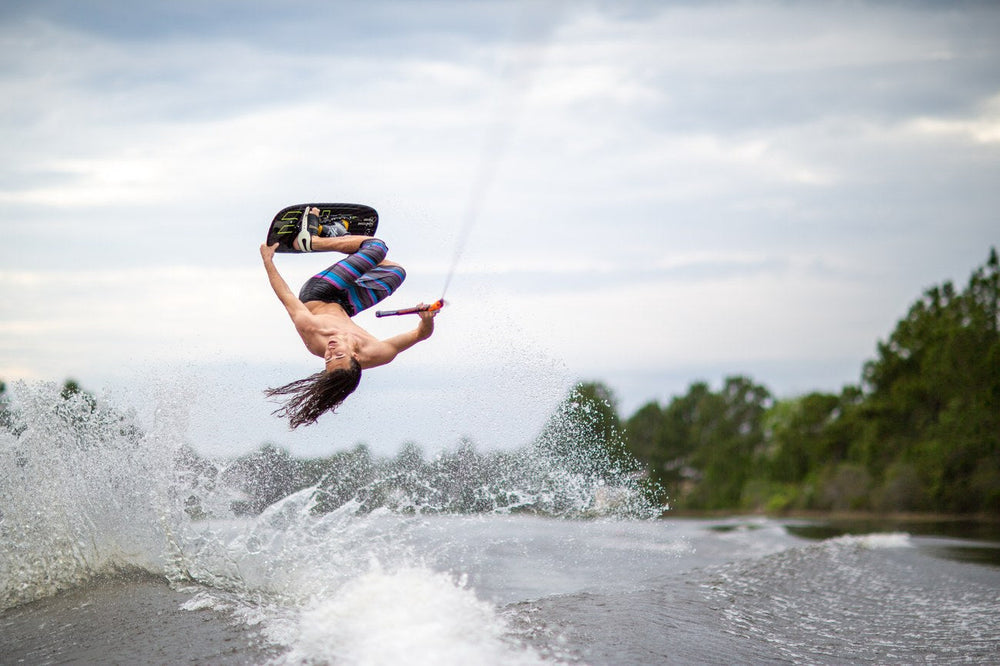 A skier upside down in the air