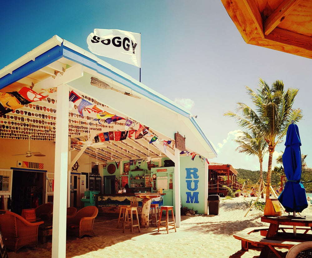 The open-air Soggy Dollar Bar on the sand