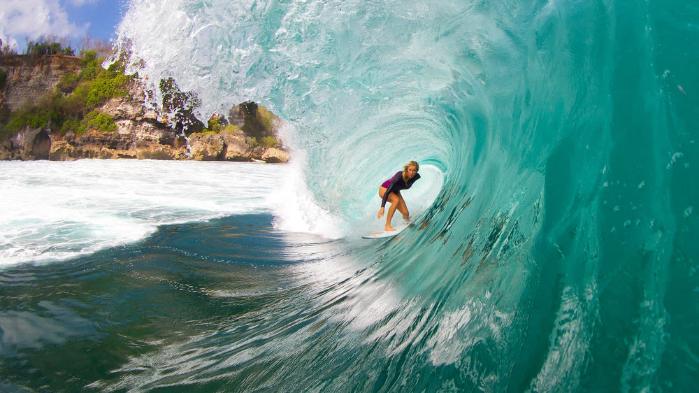 Bethany Hamilton surfing inside a barrel