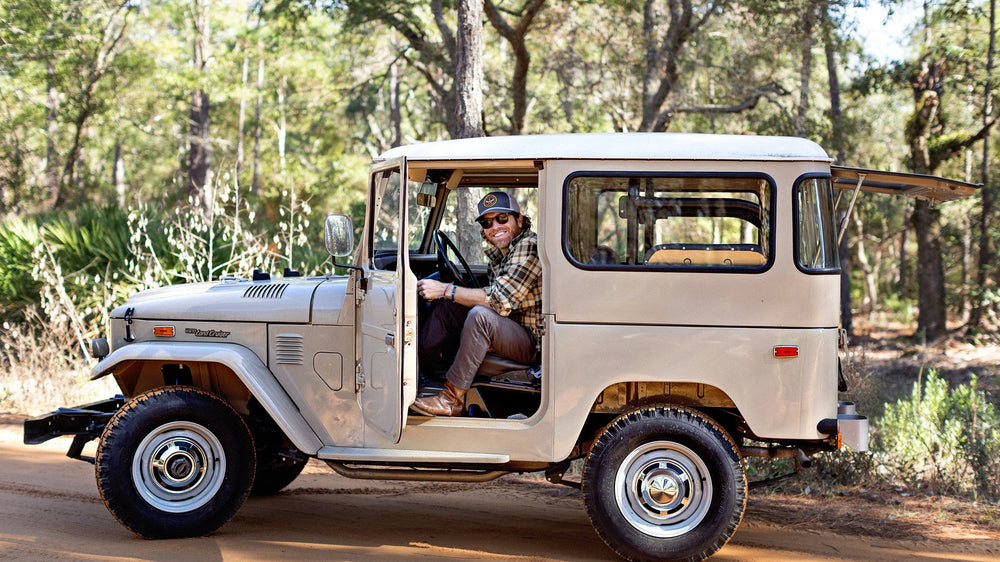 Chris Coleman with his Land Cruiser on the Gulf Coast