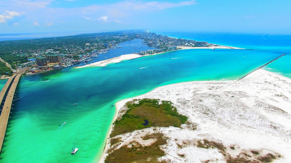 Aerial view of Destin's East Pass and the jetties from Santa Rosa Island