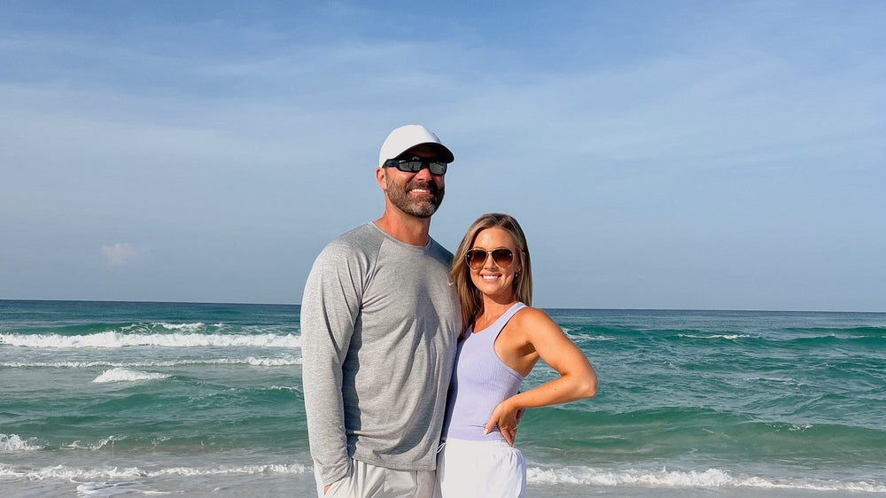 Amanda West and her husband on the 30A shoreline