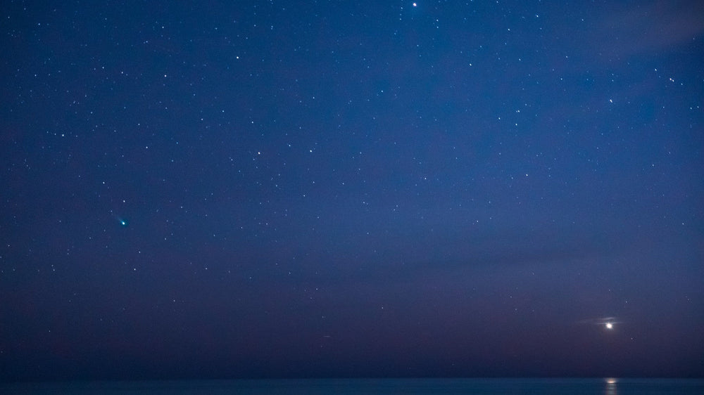 Moonlight on the Gulf under a field of stars
